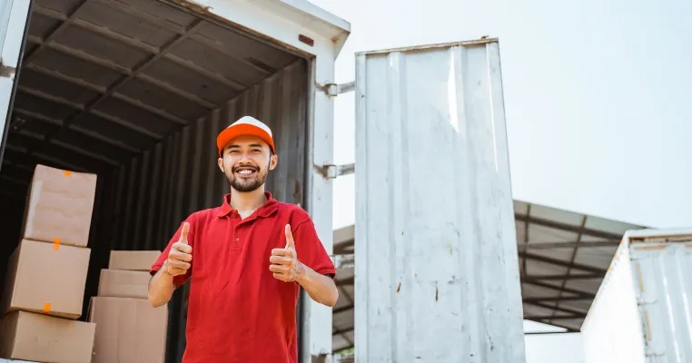 https://www.shutterstock.com/image-photo/warehouse-workers-red-smiling-thumbs-standing-2252948437